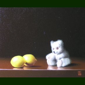 Bamse som betragter to citroner