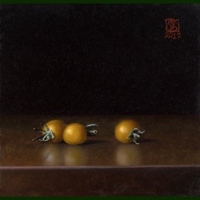 Tre hjemmedyrkede cherrytomater